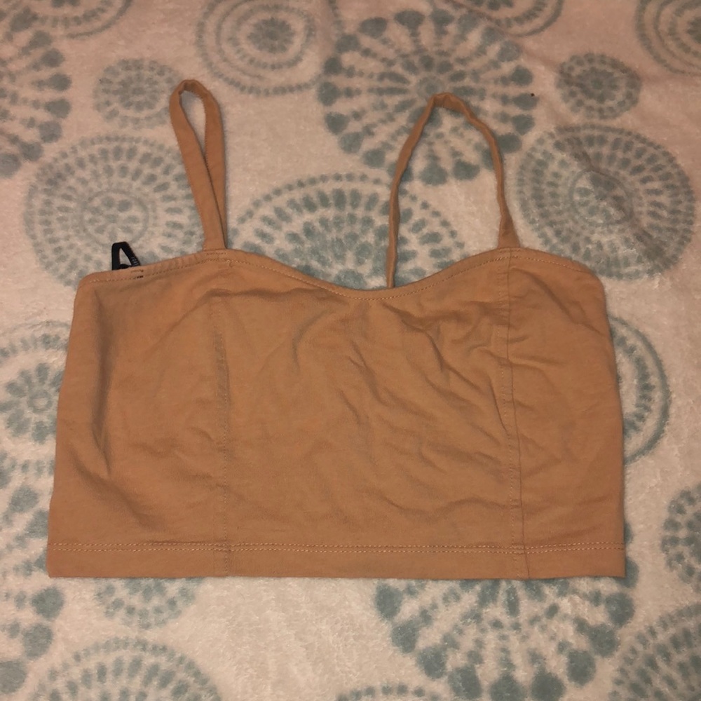 A beige crop top